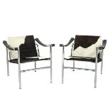 A Pair of Corbusier Pony Skin Fauteuils