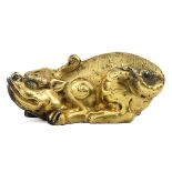 A Small Gilt Dragon Sculpture