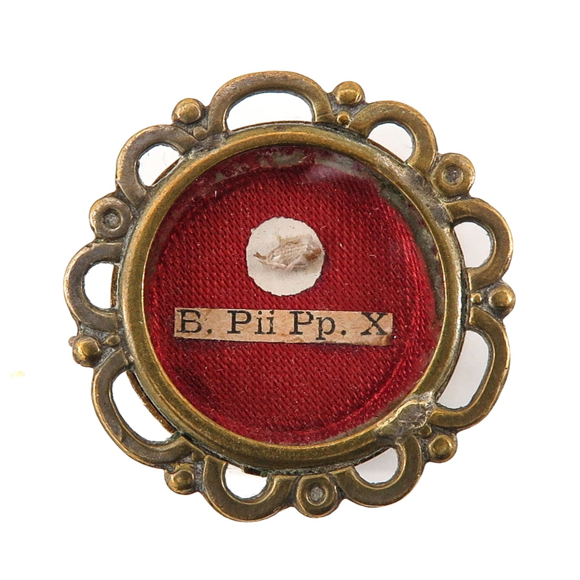 A Relic Holder Including Relic from Pope Pius X with Certificate