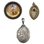 A Collection of 3 Relic Holders with Relics from Saint Theresa