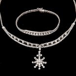 A 18KG Diamond Necklace and Bracelet