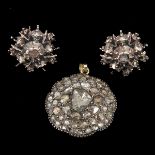 A Pair of Diamond Earrings and Pendant