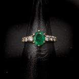 An 18KG Emerald and Diamond Ring