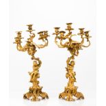 A pair of six branch Louis XV style candelabra
