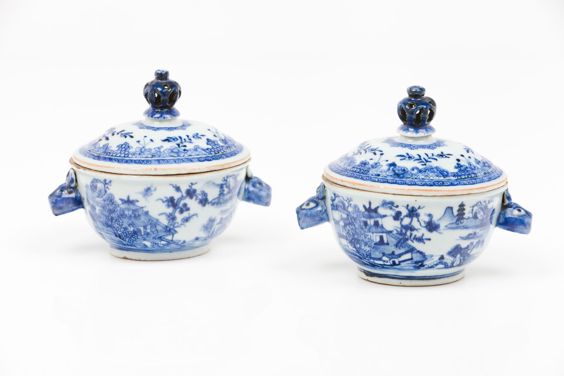 A pair of small oval tureens and covers
