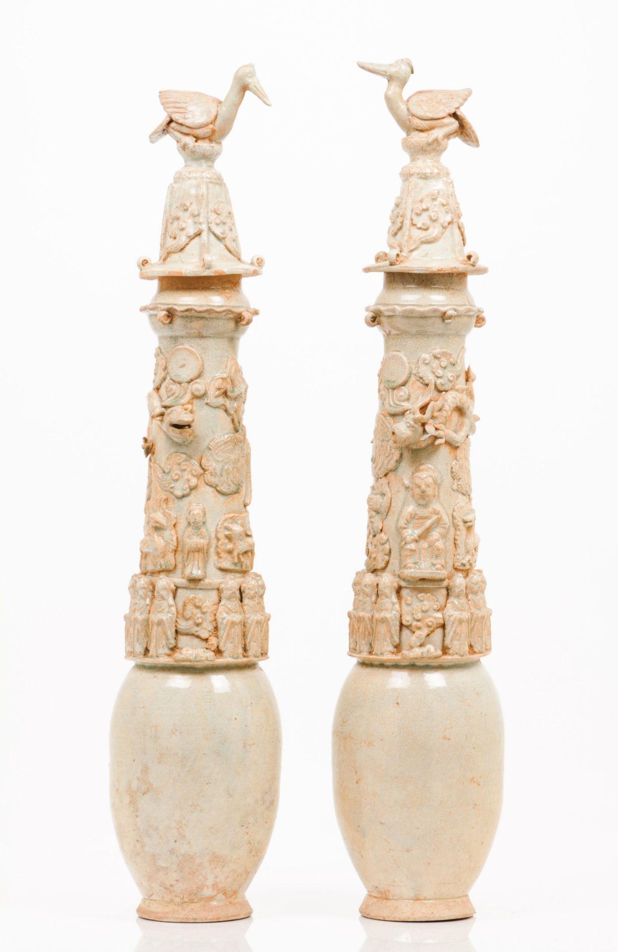 A pair of funerary vases with covers