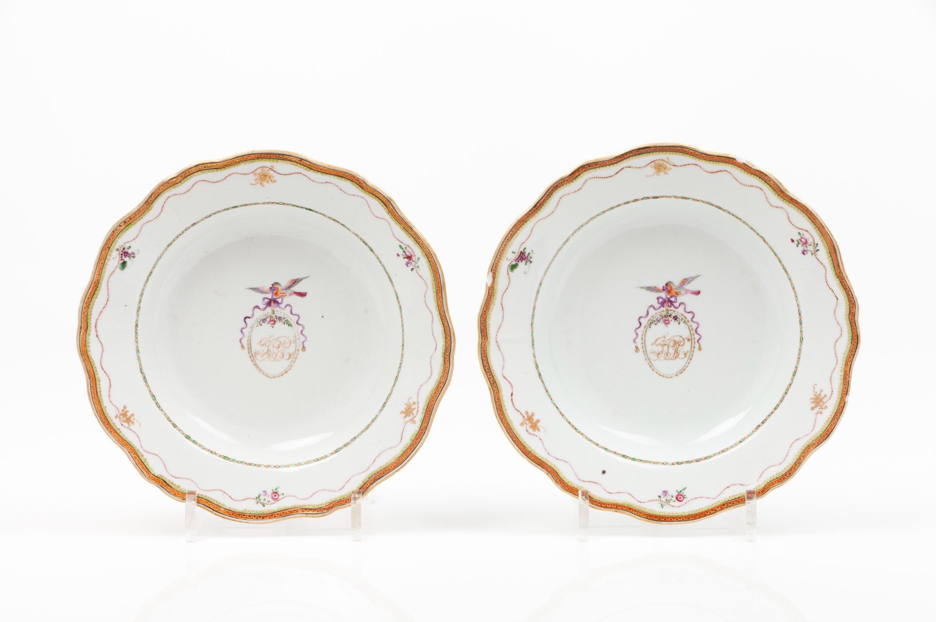 A pair of scalloped soup plates