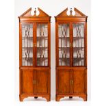 A pair of D.Maria style corner cupboards