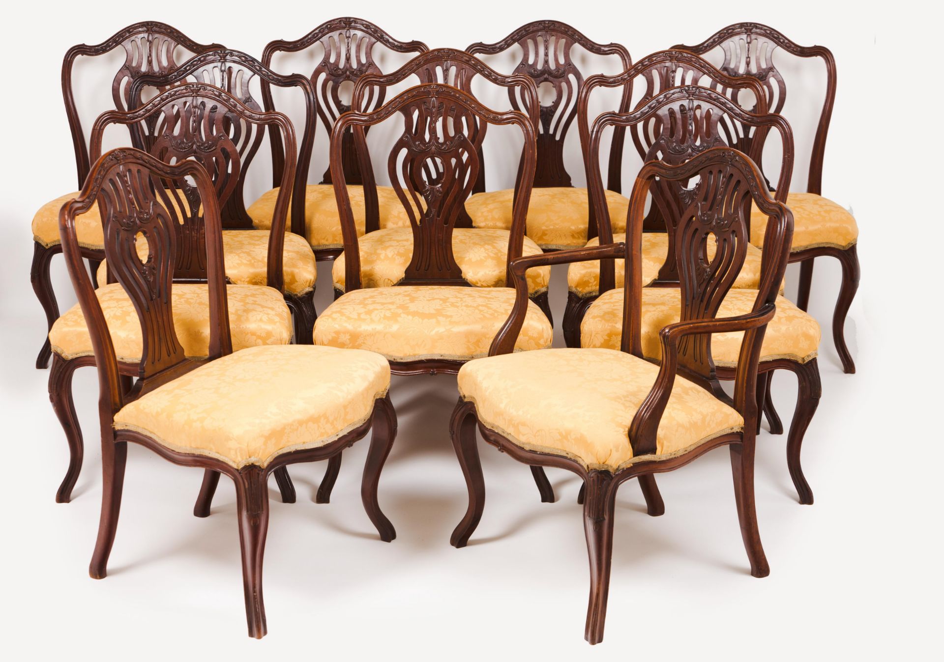 A set of twelve George III chairs