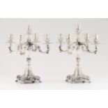 A pair of five branch candelabra