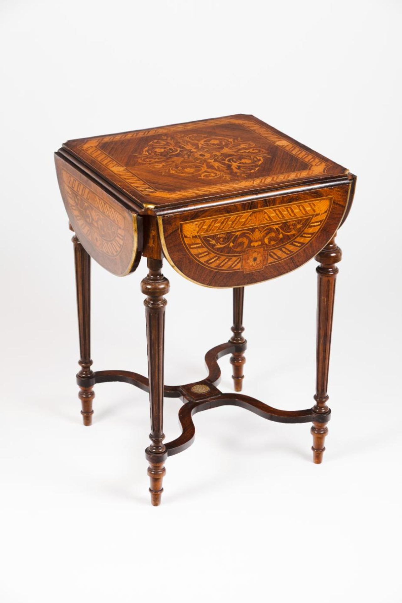 A Napoleon III dropleaf side table