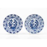 A pair of scalloped plates