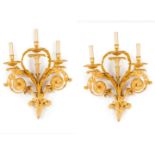 A pair of three branch Louis XV style wall sconces