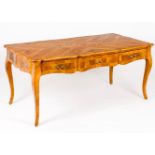 A Louis XV bureau platVarious timbers marquetry decoration Three drawers, cabriole legs Yellow metal