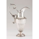 A large jugPortuguese silver Neoclassical decoration of part fluted and grooved body with beaded