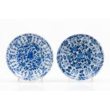 A pair of platesChinese porcelain Gadrooned and scalloped rim Floral blue underglaze decoration