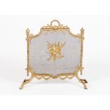A Louis XVI style fire grateGilt bronze and metal grid Reliefs decoration of drapes and foliage