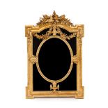 A Napoleon III wall mirrorCarved and gilt wood and gesso Sectioned wood of central bevelled glass
