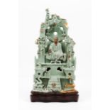 A Longquan celadon shrineShaped as tiered rock formation decorated with applied foliage scrolls an