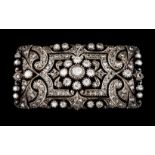 A large Romantic era broochGold and silver Rectangular shaped with central flower and pierced