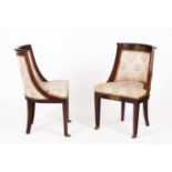 A pair of Empire style chairsMahogany Gilt bronze mounts Claw feet Silk upholstered Europe, 19th /
