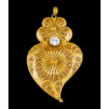 A large heart pendantGold filigree Set with one colourless stone Deer hallmark 800/1000 (1985-