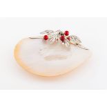 A small dishSilver mounted bivalve shell Foliage branches and small red beads simulating fruits On 3