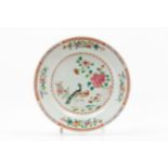 A plateChinese export porcelain Polychrome "Famille Rose" enamelled decoration of garden view with