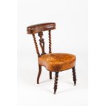 A Romantic era smoking chairCarved and scalloped oak Leather upholstery Europe, 2nd-half 19th