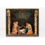 A crib with casePainted case with sliding glass door Terracotta sculptures Polychrome and gilt