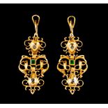 A pair of drop earringsPortuguese sequillé type gold Articulated elements of scroll decoration set
