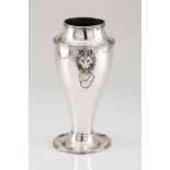 A vasePortuguese silver Plain urn shaped body with two applied classical masks of suspended rings