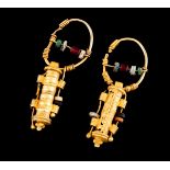 A pair of Roman earringsGold Ornamented with hard stone and ceramic beads, twisted and turned