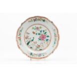 A large scalloped plateChinese export porcelain Polychrome "Famille Rose" enamelled decoration of