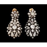 A pair of drop earringsSilver and gold Foliage inspired decoration set with antique cut diamonds