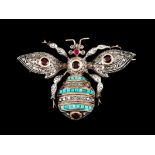 A broochGold and silver A bumble bee set with rose cut diamonds, 4 garnets, 1 ruby and pyramidal cut