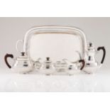 A tea and coffee set with trayPortuguese silver Plain body part fluted to base and gadrooned