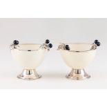 A pair of bowlsSilver and ostrich egg Applied foliage branches and lapis lazuli beads simulating