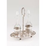 A cruet setPortuguese silver Neoclassical style with two cruet holders of foliage decoration and rim