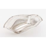 An unusual fruit bowlPortuguese silver Plain centre of raised and undulating part fluted lip,