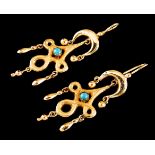 A pair of drop earringsPortuguese gold, 19th century Interlaced elements and drops set with two