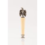 A bellSilver Eagle on plain ivory column Monogrammed stand Boar hallmark 833/1000 (1938-1984) and