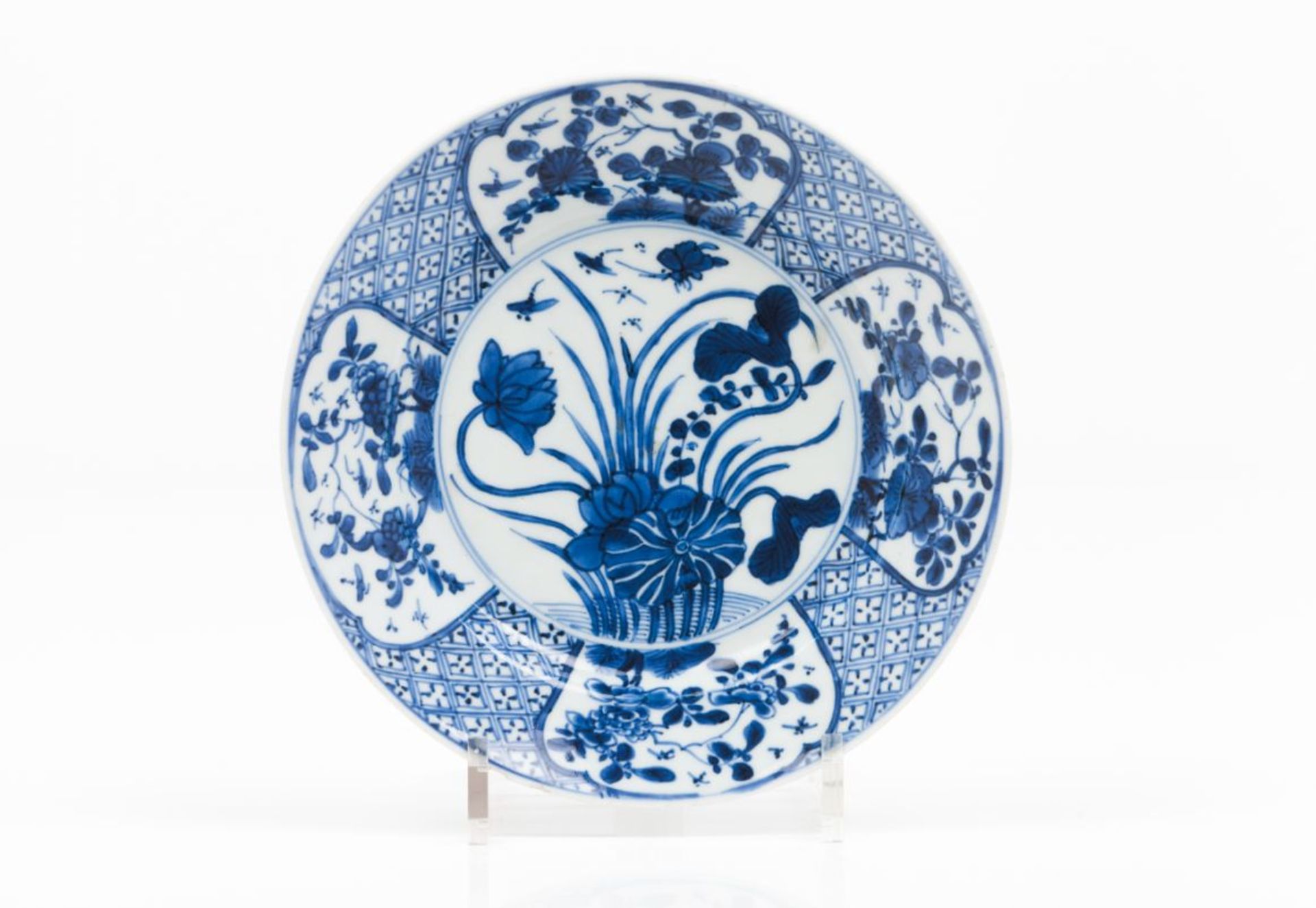 A platePorcelain Blue decoration with central landscape China, Kangxi reign (1662-1722) (chips)