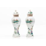 A pair of vases with coversChinese export porcelain Polychrome decoration with river views, pagoda