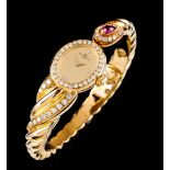 A lady's Baume & Mercier watch18 kt gold Spiralled strap set with 28 brilliant cut diamonds and