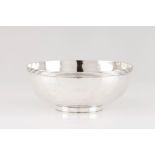 A bowl Portuguese silver, 19th century Plain body of applied grooved frieze to top On a circular