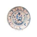 A platePortuguese faience Cobalt-blue and manganese decoration of landscape with deer Baroque band
