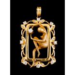 A pendantGold Carved female figure holding a ball set with 22 brilliant cut and rose cut diamonds