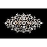 A Romantic era broochGold and silver Oblong shaped of pierced foliage motifs and scrolls