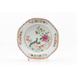 An octagonal deep plate Chinese export porcelain Polychrome “Famille Rose” enamelled decoration of